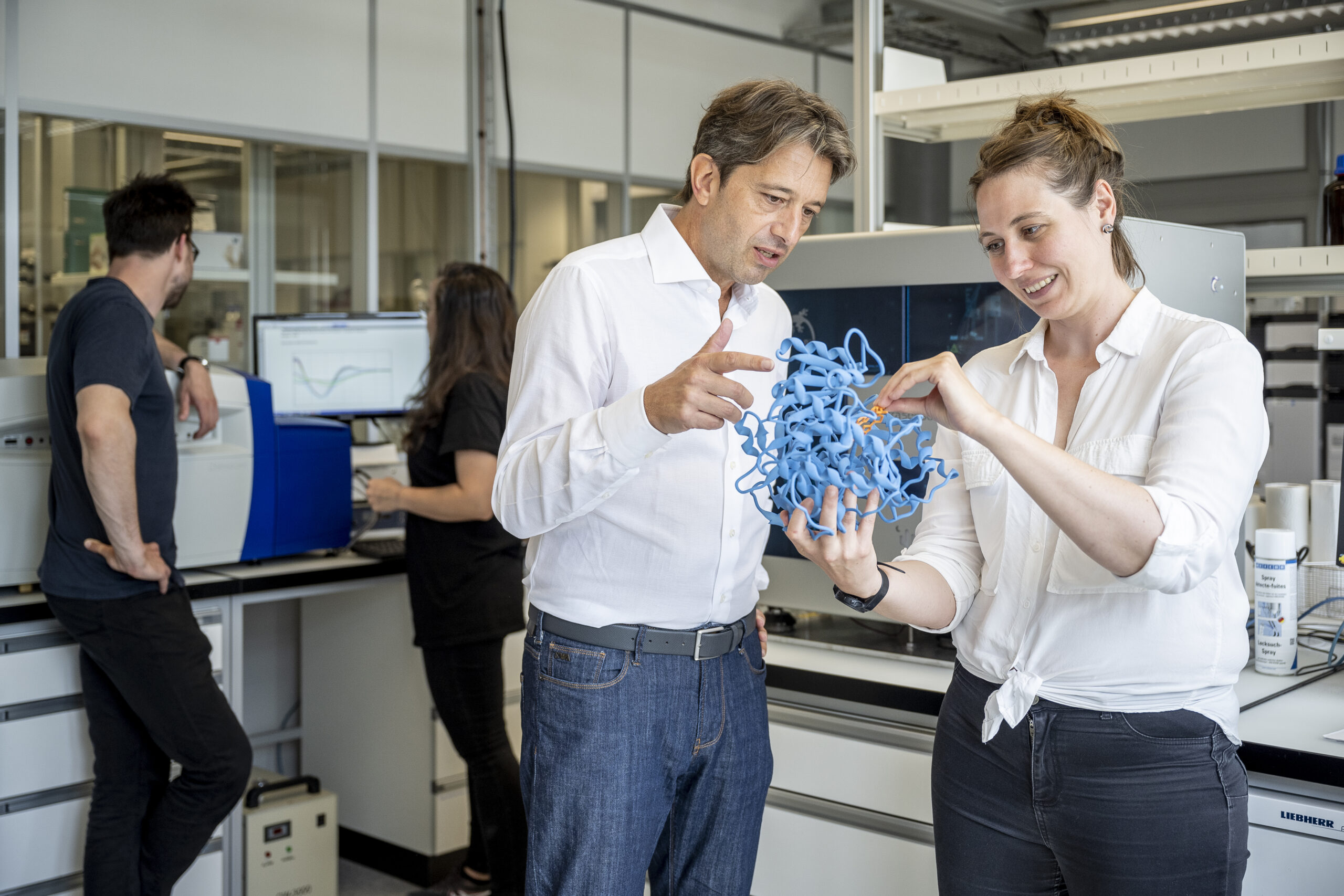 Gisbert Schneider with lab members at the Molecular Design Laboratory (MODLAB) at ETH Zurich. MODLAB develops new computer methods for medicinal chemistry and translates them into immediate practical application.